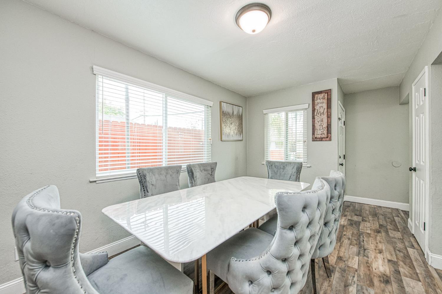 2471 Nebraska Avenue Selma, CA 93662 - Photo 11 of 29 a view of a dining room with furniture and wooden floor