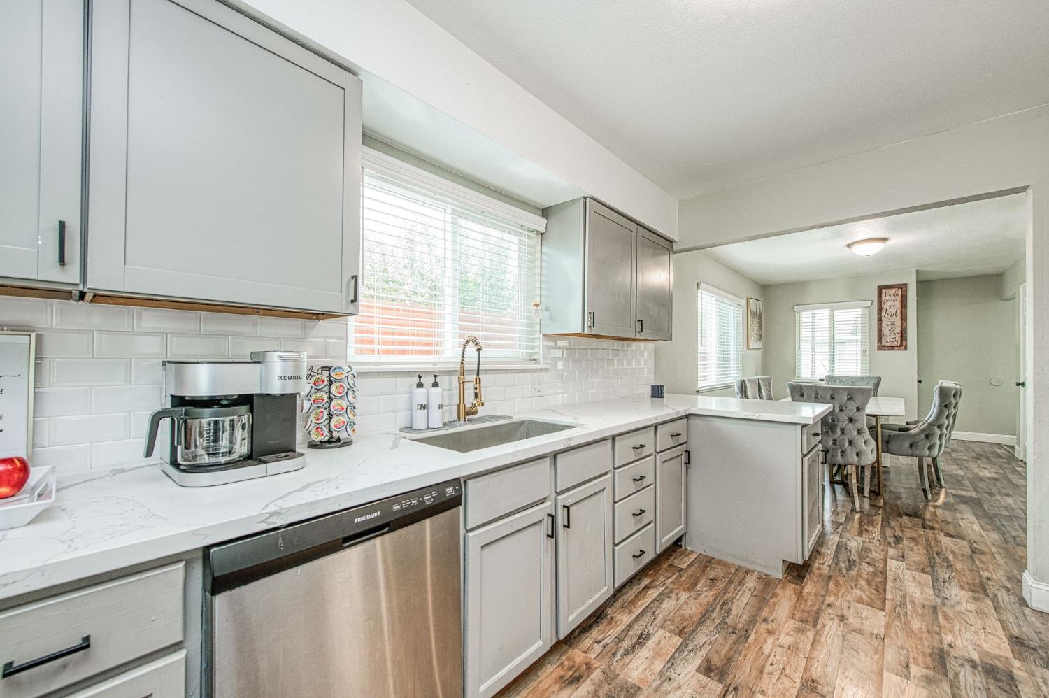 2471 Nebraska Avenue Selma, CA 93662 - Photo 15 of 29 a kitchen with sink cabinets and window