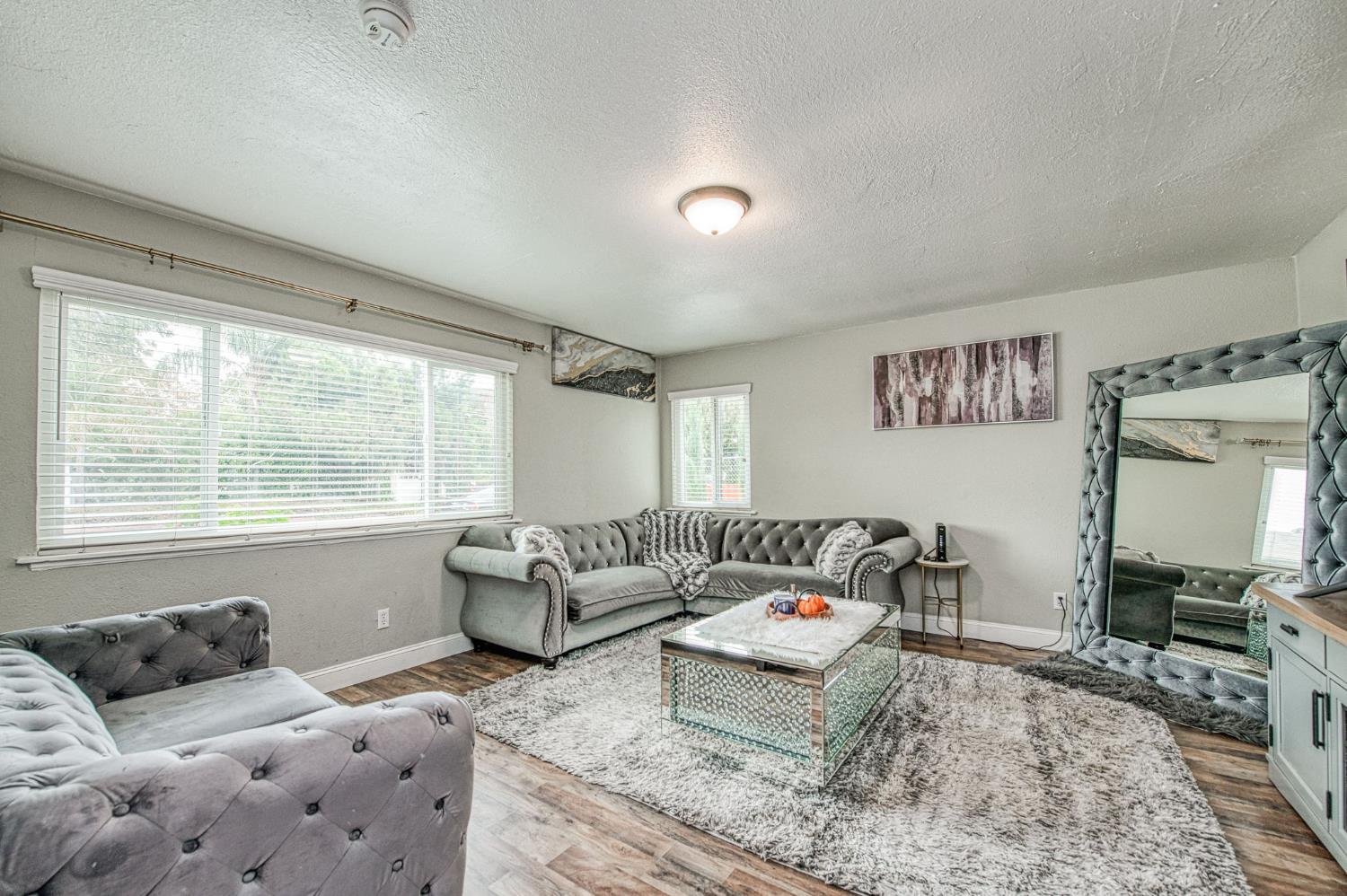 2471 Nebraska Avenue Selma, CA 93662 - Photo 5 of 29 a bedroom with furniture and a window