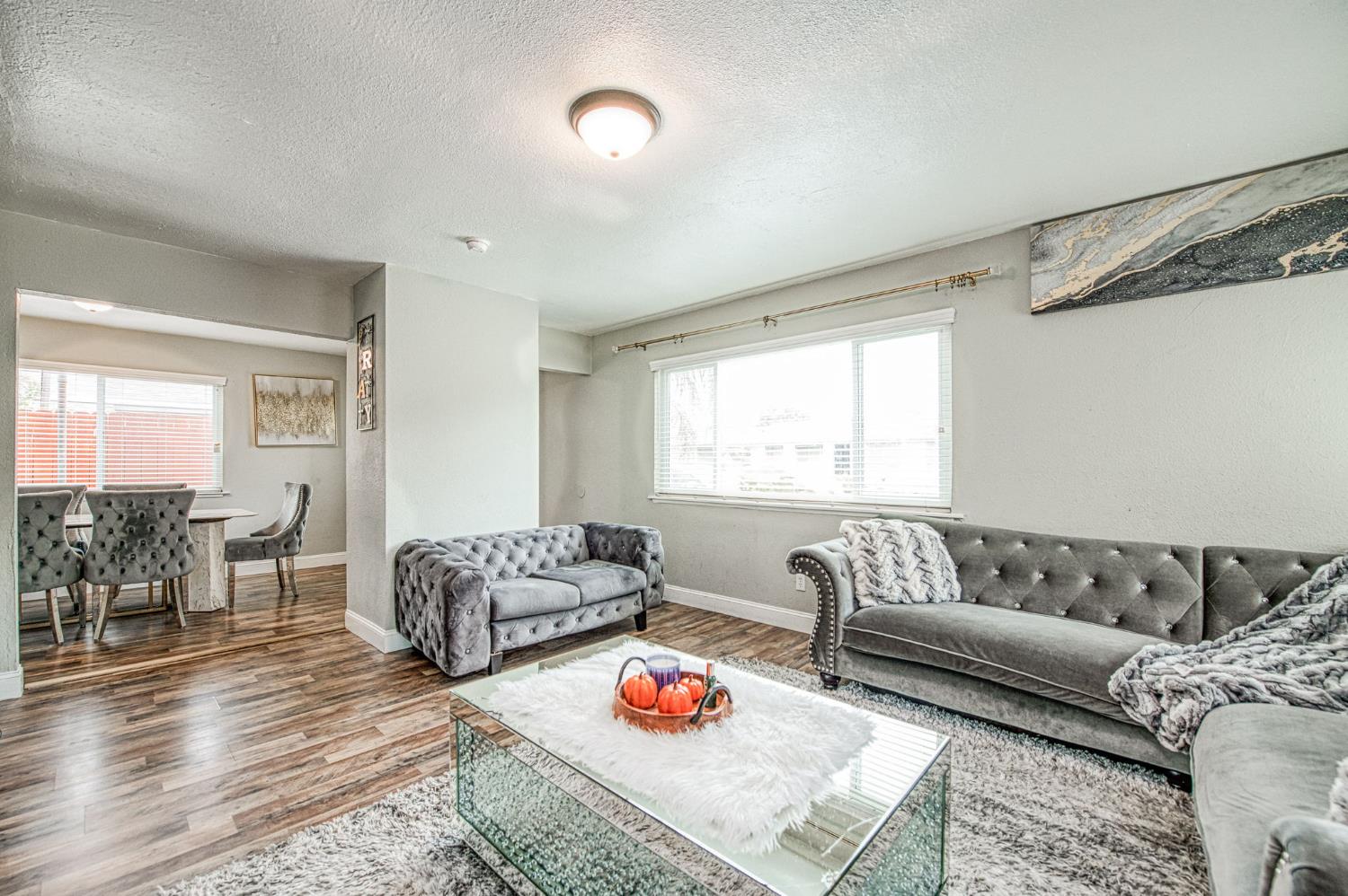 2471 Nebraska Avenue Selma, CA 93662 - Photo 6 of 29 a living room with furniture and wooden floor