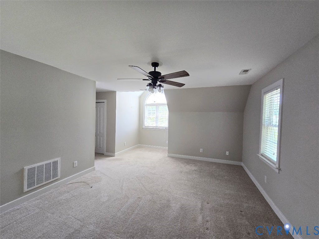 16406 Benmore Road Moseley, VA 23120 - Photo 25 of 32 a view of an empty room with a window