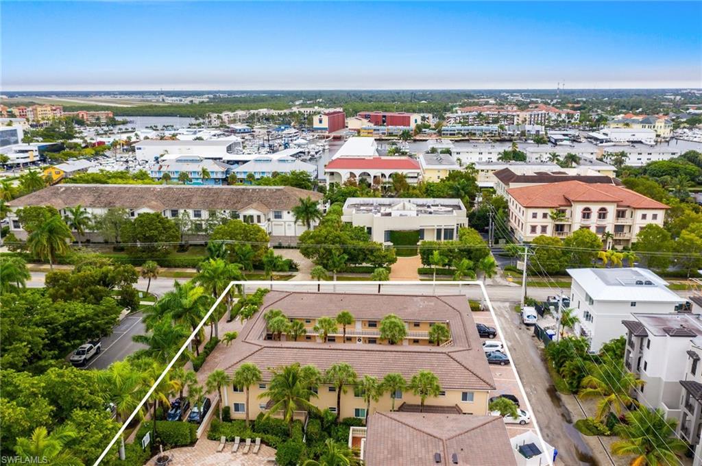 980 7th Avenue South, Unit 101 Naples, FL 34102 - Photo 30 of 32 an aerial view of a city