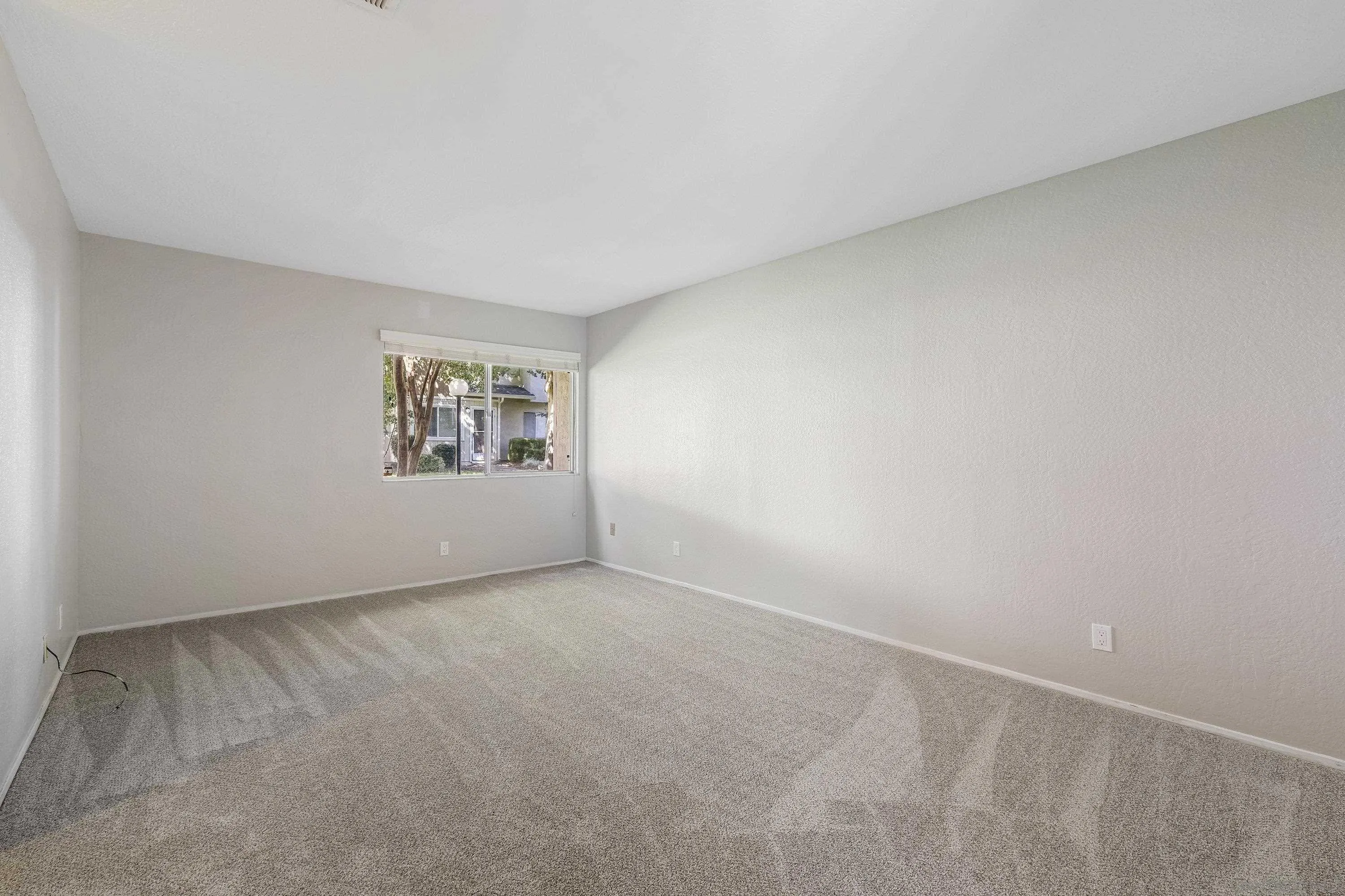 379 Eldridge Avenue Vacaville, CA 95688 - Photo 4 of 19 an empty room with windows