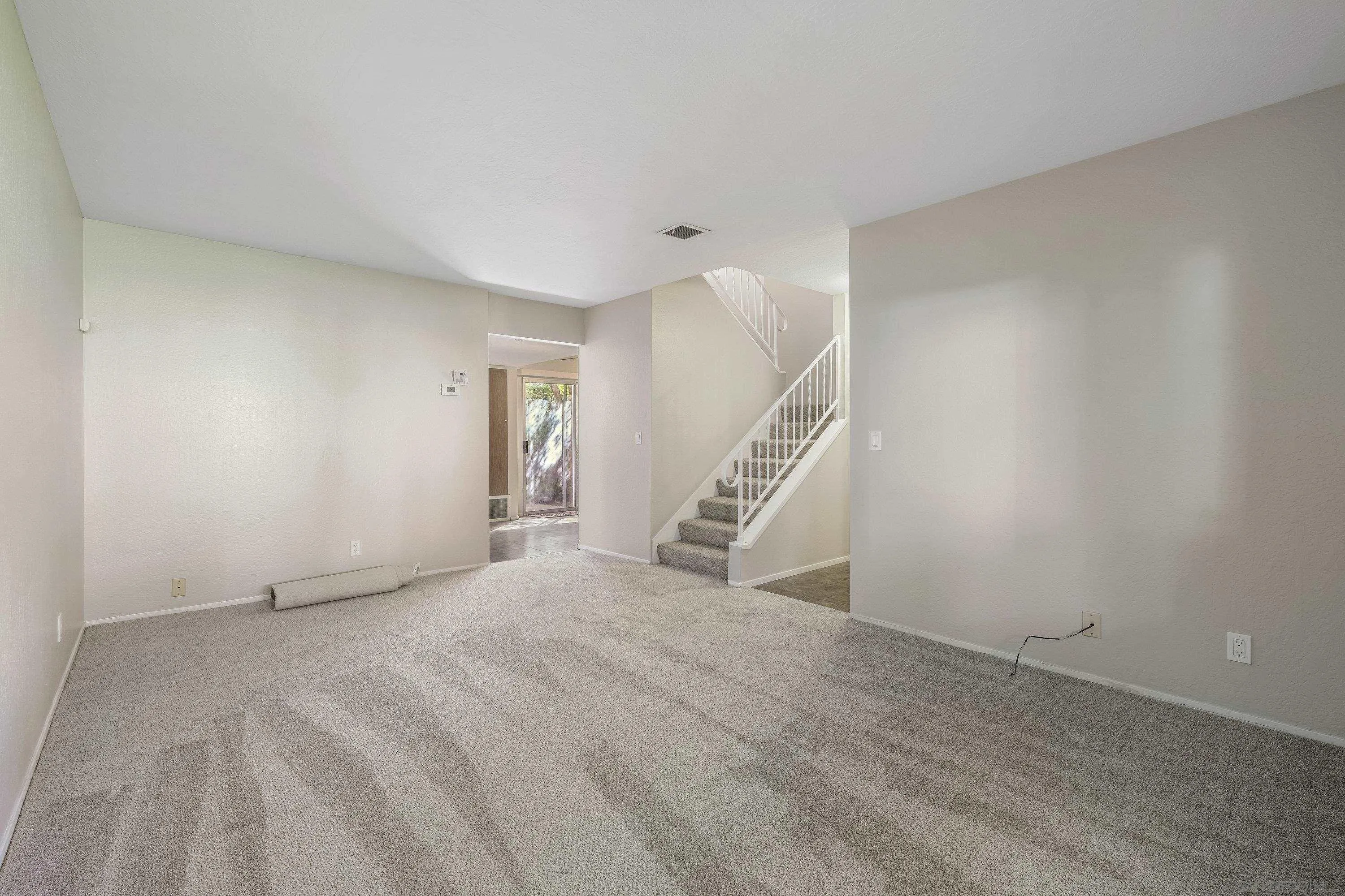 379 Eldridge Avenue Vacaville, CA 95688 - Photo 5 of 19 a view of an empty room with stairs