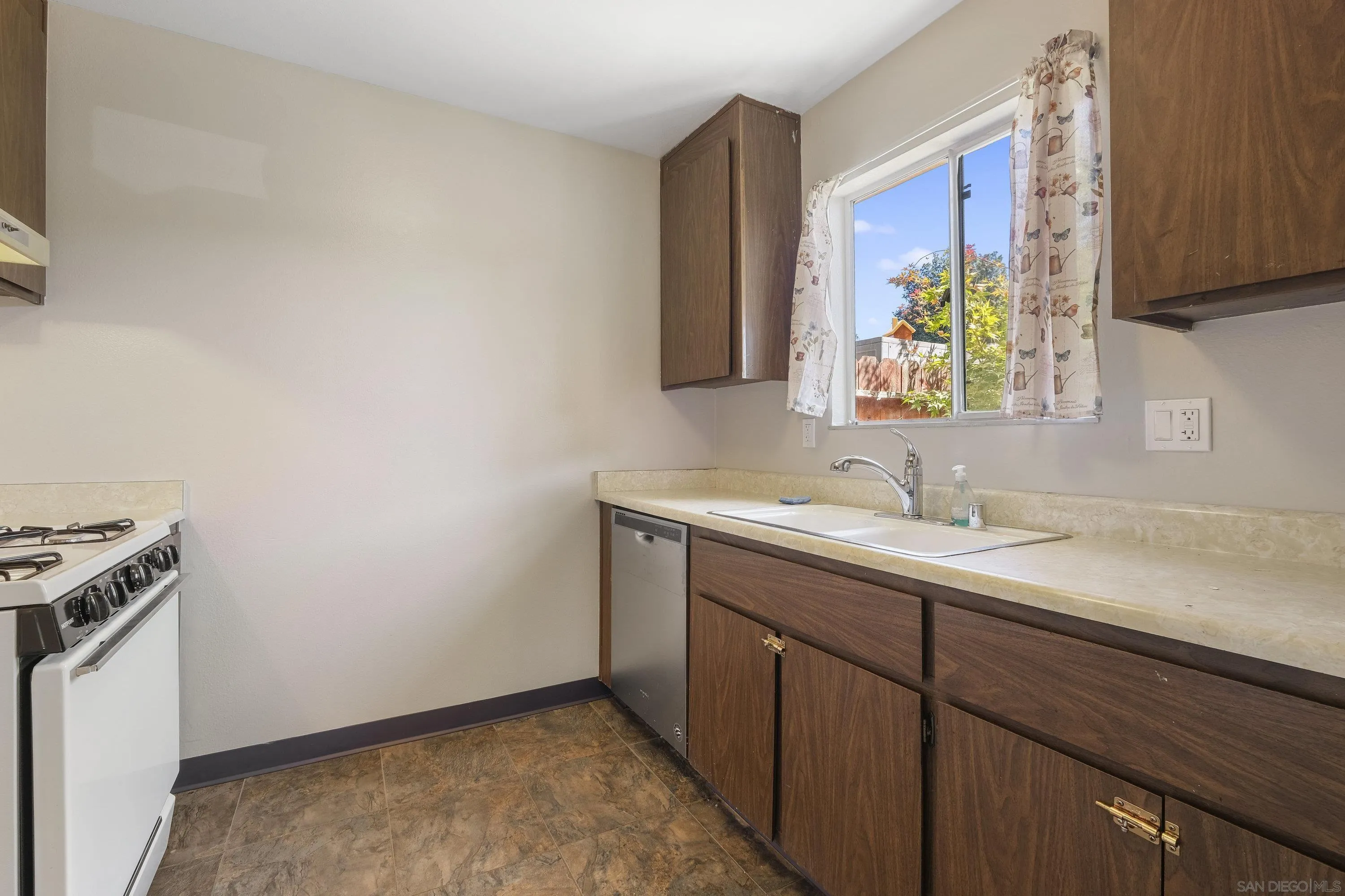 379 Eldridge Avenue Vacaville, CA 95688 - Photo 6 of 19 a bathroom with a sink and a window
