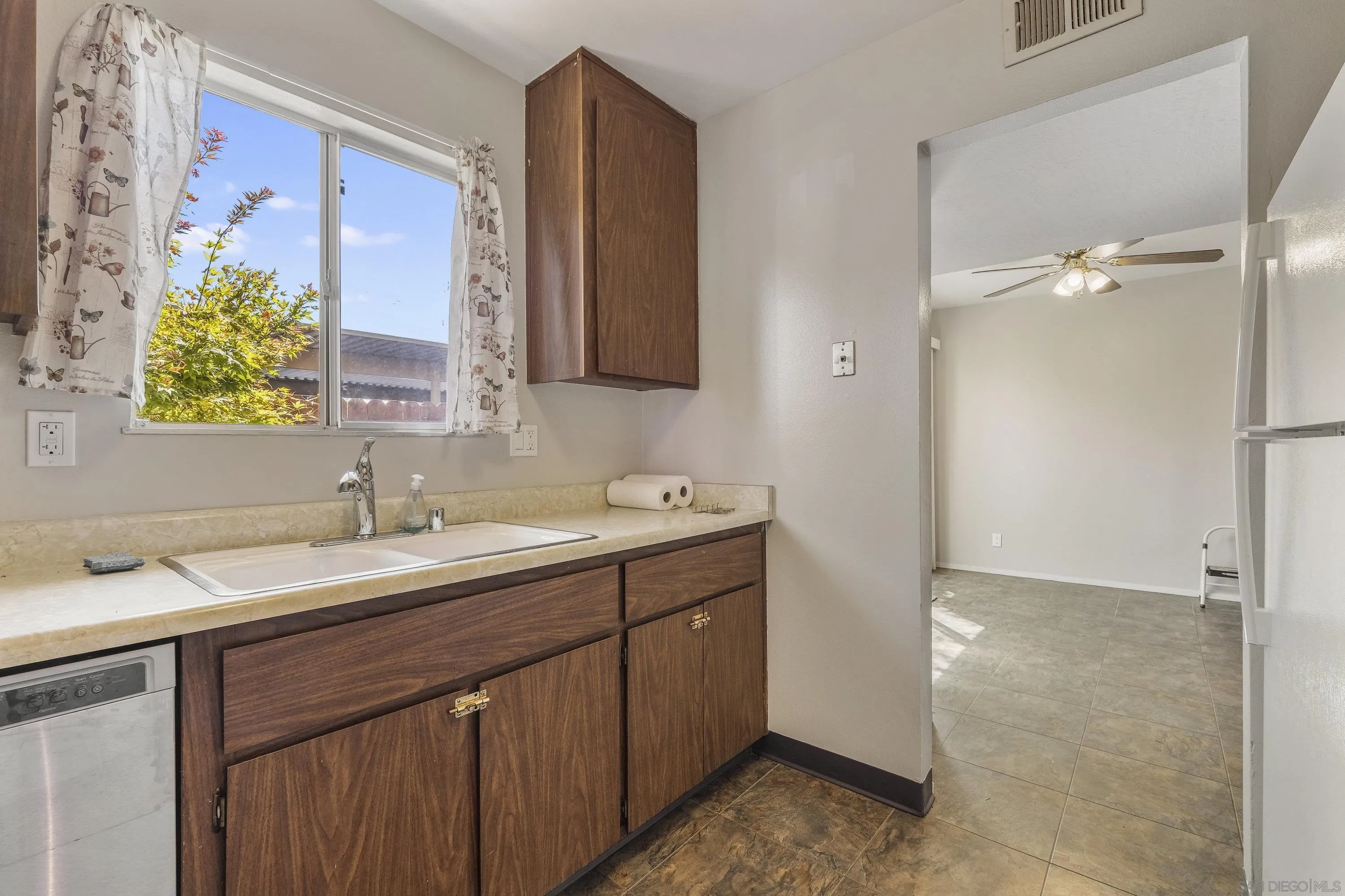 379 Eldridge Avenue Vacaville, CA 95688 - Photo 7 of 19 a bathroom with a sink and a mirror