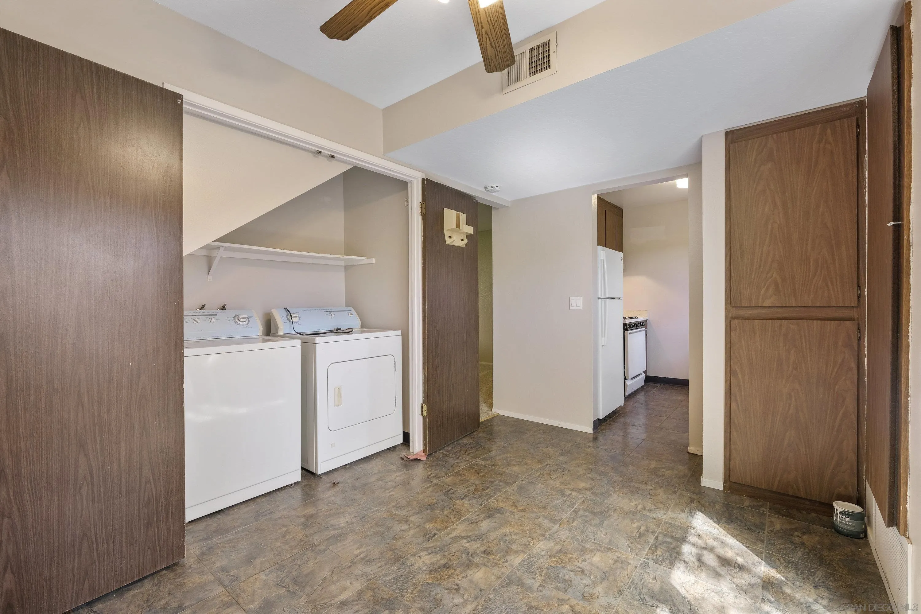 379 Eldridge Avenue Vacaville, CA 95688 - Photo 10 of 19 a view of a hallway to closet and utility room