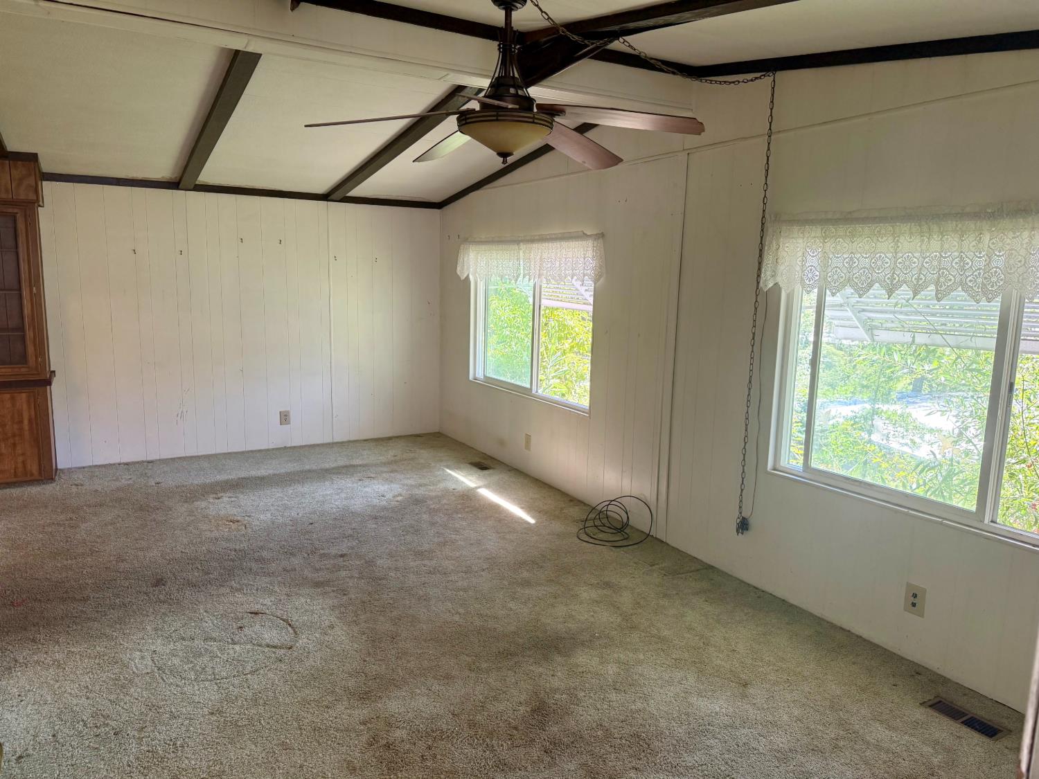 2958 Spring View Lane Placerville, CA 95667 - Photo 4 of 23 a view of a livingroom with an empty space and a window