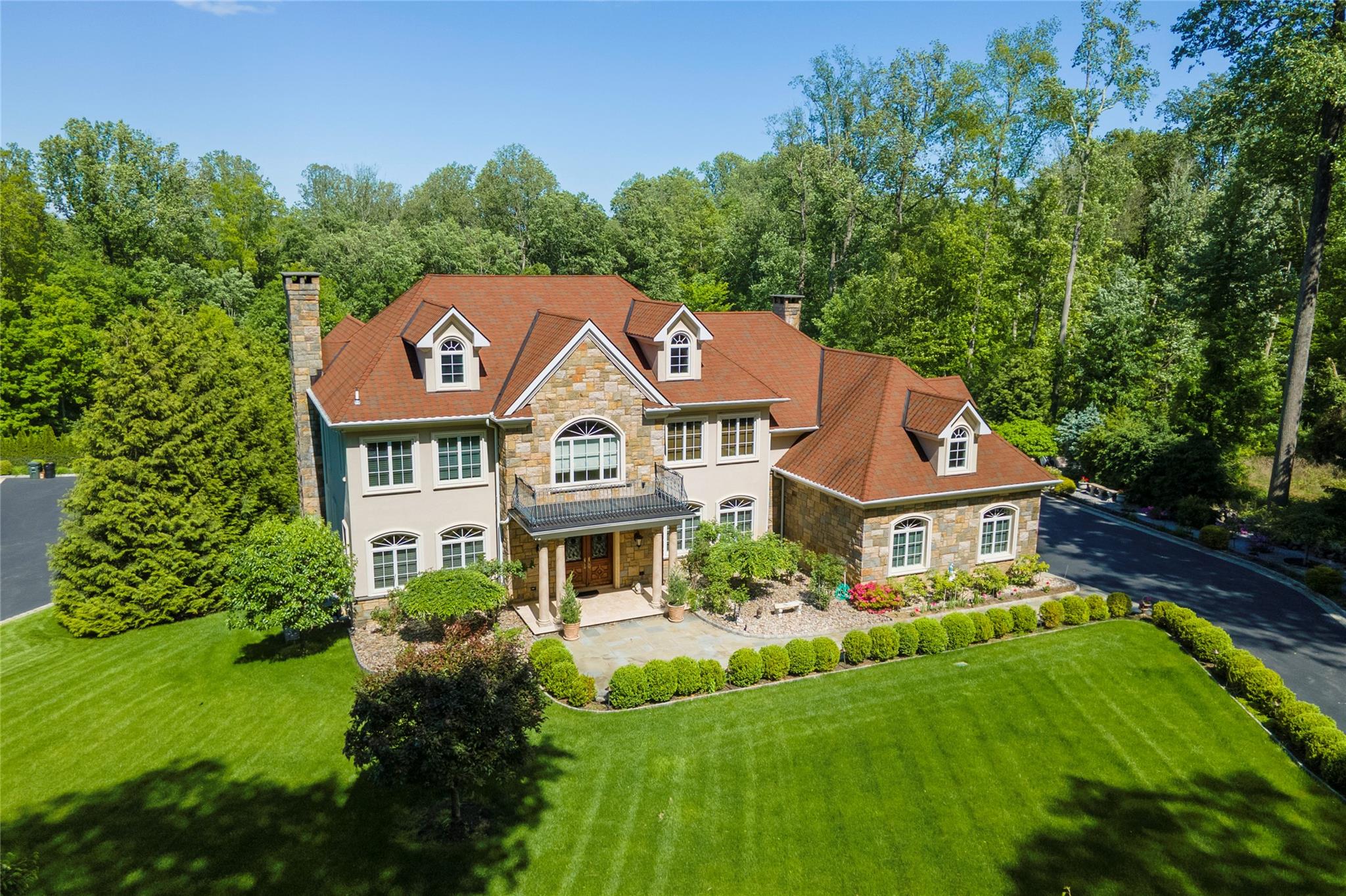a aerial view of a house with a garden