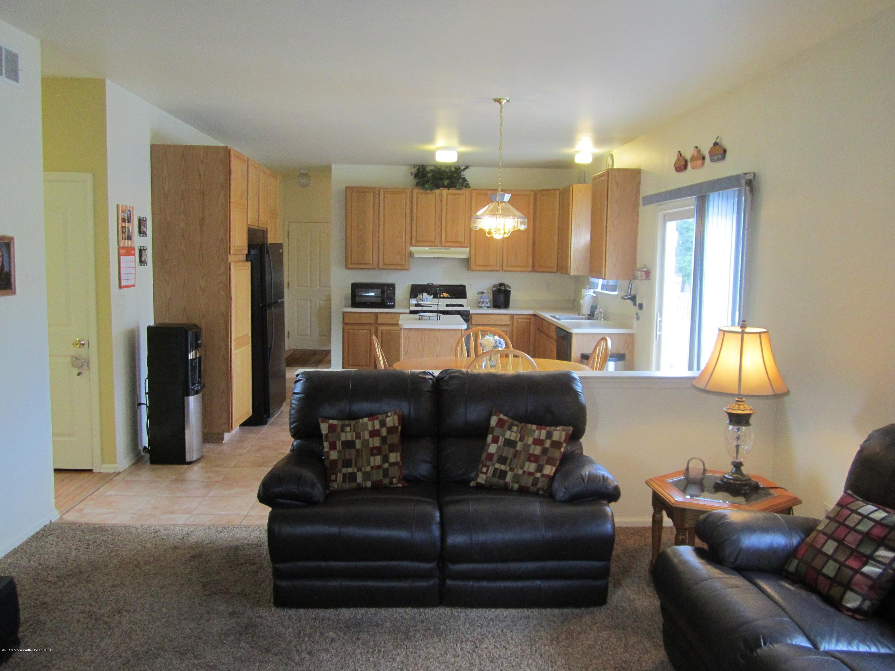 103 Valley Road Jackson, NJ 08527 - Photo 13 of 31 a living room with furniture and a large window