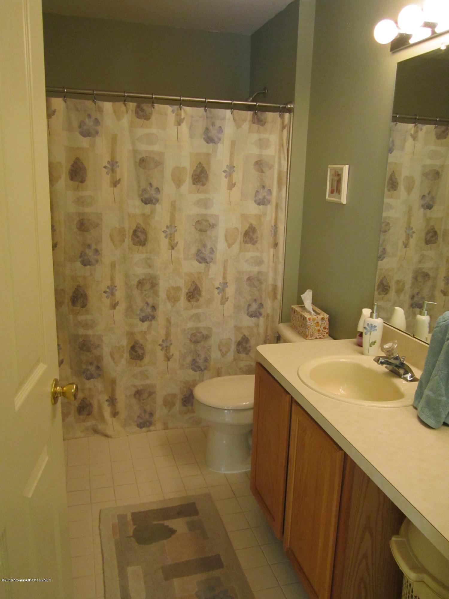 103 Valley Road Jackson, NJ 08527 - Photo 24 of 31 a bathroom with a sink a toilet and shower