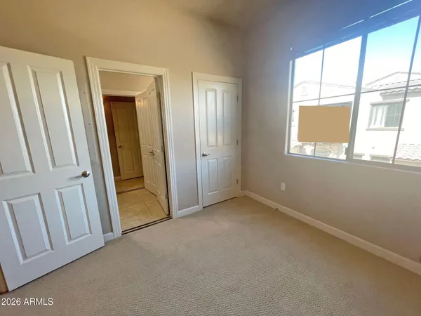 a view of a livingroom from a hallway