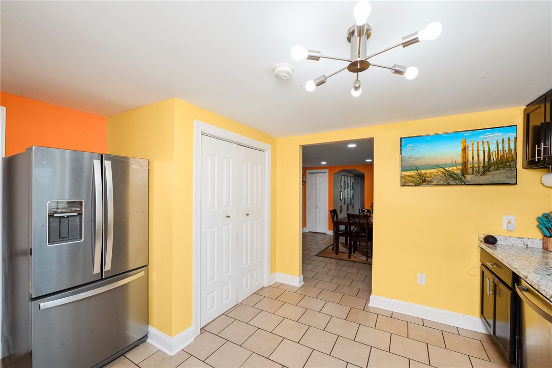 358 Finley Road Easley, SC 29642 - Photo 9 of 20 This spacious kitchen offers a bright atmosphere and easy-care tile flooring.