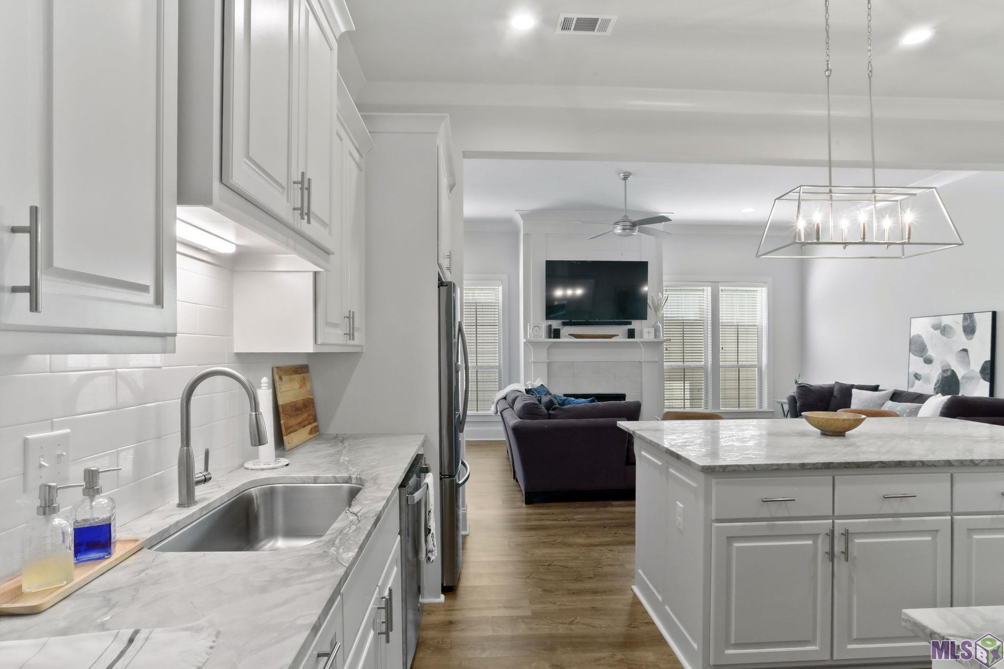 6613 Silver Oak Drive Baton Rouge, LA 70817 - Photo 11 of 18 Kitchen open to living room