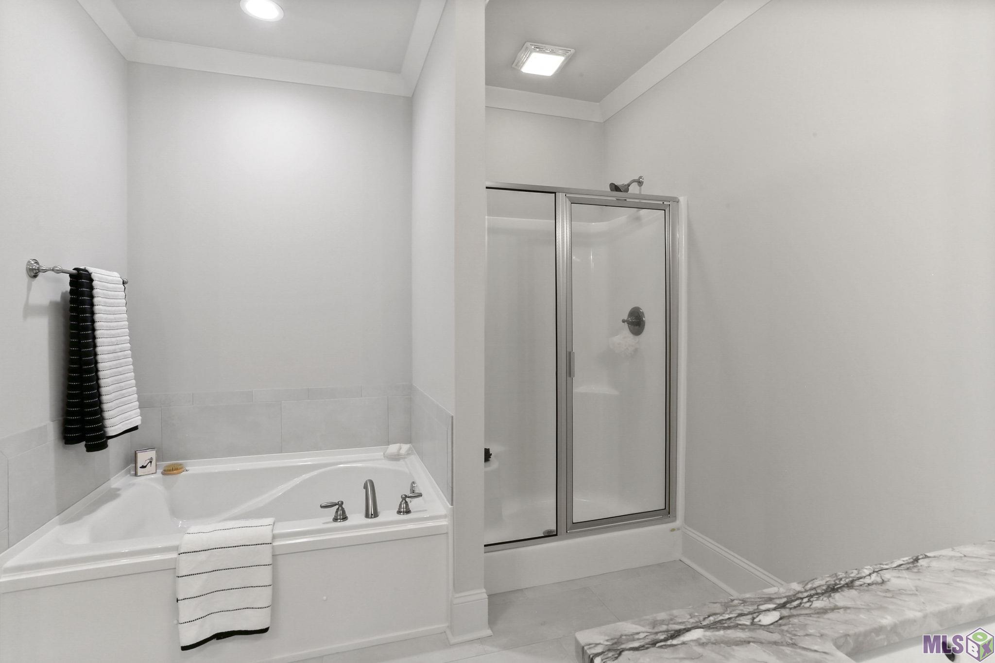 6613 Silver Oak Drive Baton Rouge, LA 70817 - Photo 14 of 18 Primary bath with separate shower and soaking tub