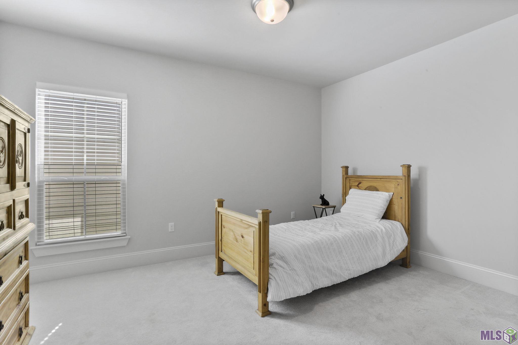 6613 Silver Oak Drive Baton Rouge, LA 70817 - Photo 18 of 18 Spacious guest room