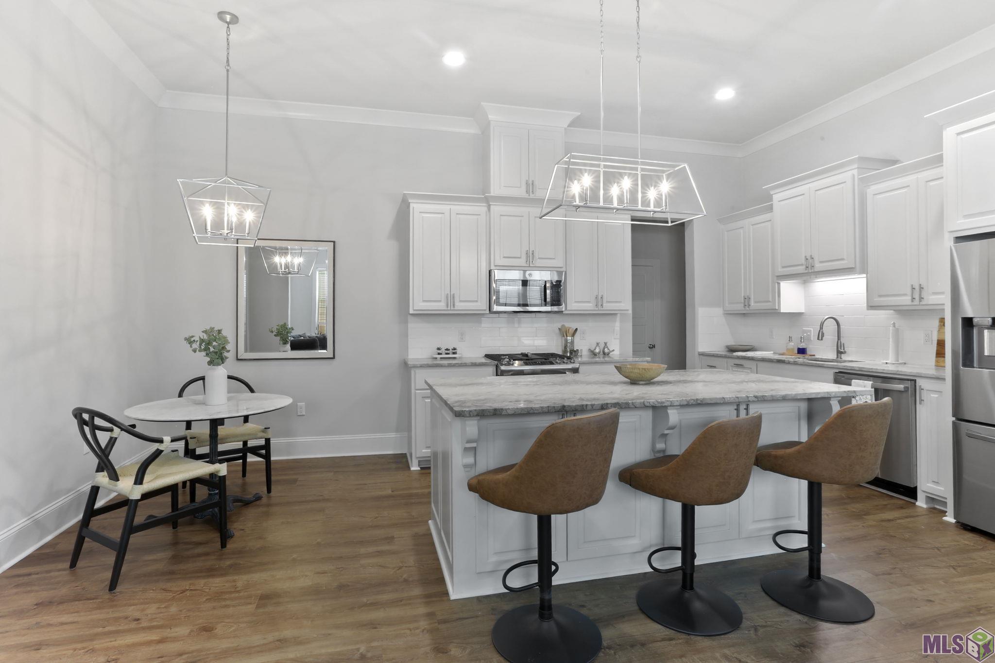 6613 Silver Oak Drive Baton Rouge, LA 70817 - Photo 8 of 18 Open kitchen and dining room