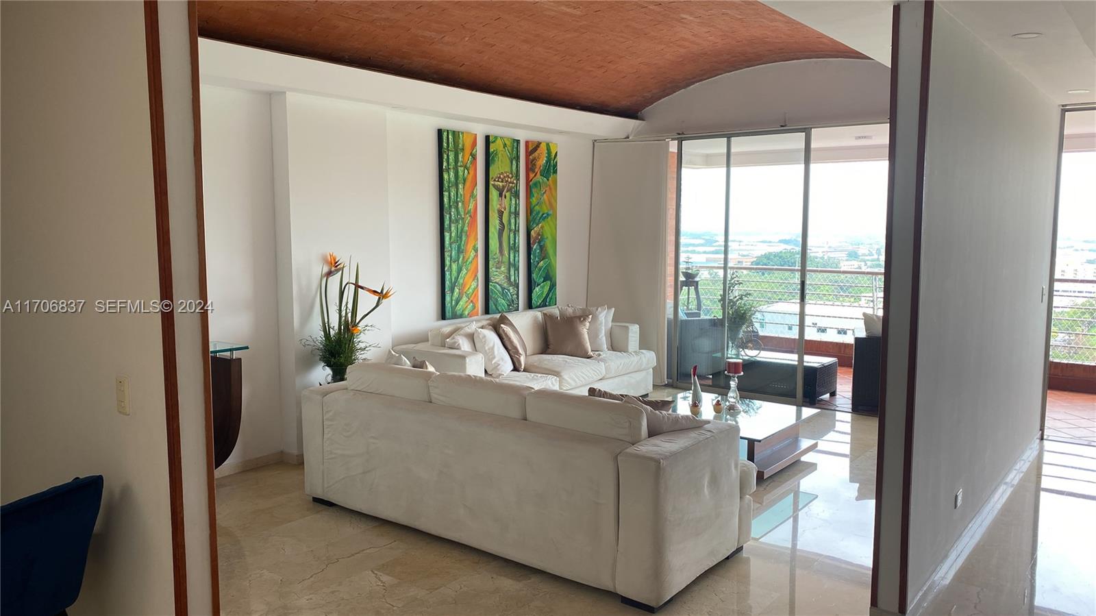 9 Avenida, Unit 1002 Arlington, CA 76004 - Photo 2 of 16 a living room with furniture and a large window