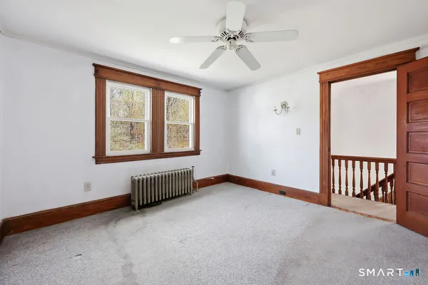 an empty room with windows