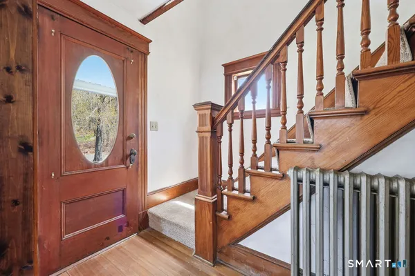 a view of livingroom with hardwood floor and ceiling fan