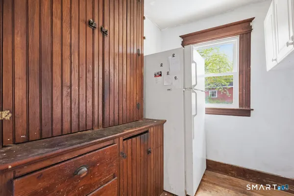 a kitchen with stainless steel appliances granite countertop a stove and a refrigerator
