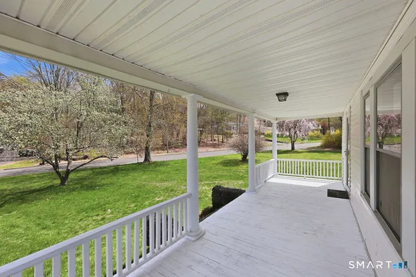 a view of porch with a backyard
