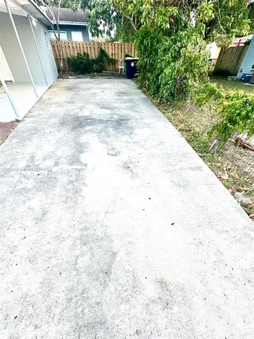 a view of backyard with green space