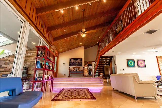 a very nice looking room with furniture and a rug