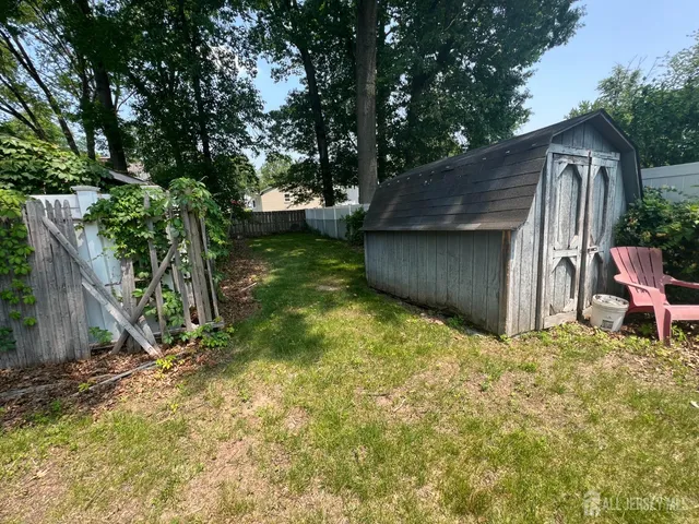 a backyard of a house with seating space