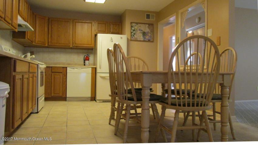 35 A Zacatin Road, Unit 1000 Freehold, NJ 07728 - Photo 4 of 16 a view of a walk in closet