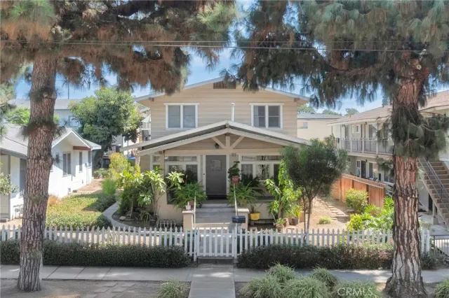 a view of a house with patio and garden