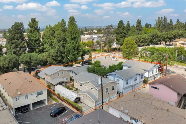 a aerial view of a house with a yard