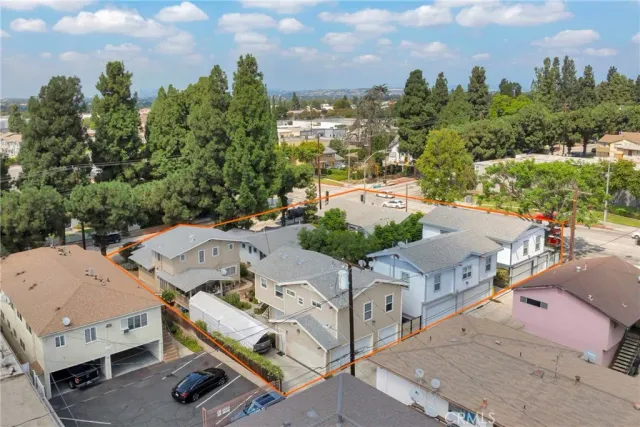 a aerial view of a house with a yard