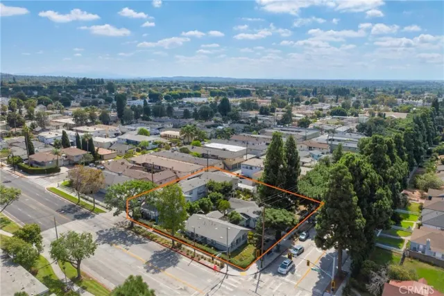 a view of a balcony with furniture and wooden floor