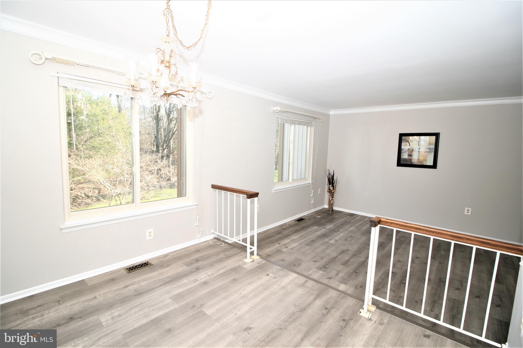 8943 Centerway Road Gaithersburg, MD 20879 - Photo 6 of 34 a view of an empty room with a window
