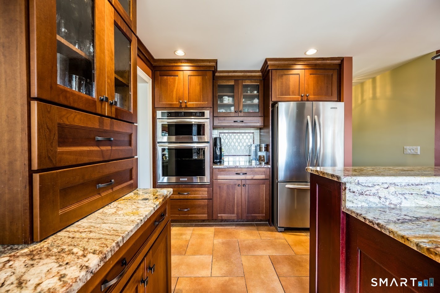 35 Anderson Lane Durham, CT 06422 - Photo 5 of 25 A wall of custom cabinetry, microwave oven combo, and generous storage make this gourmet kitchen ideal for everyday living and entertaining.