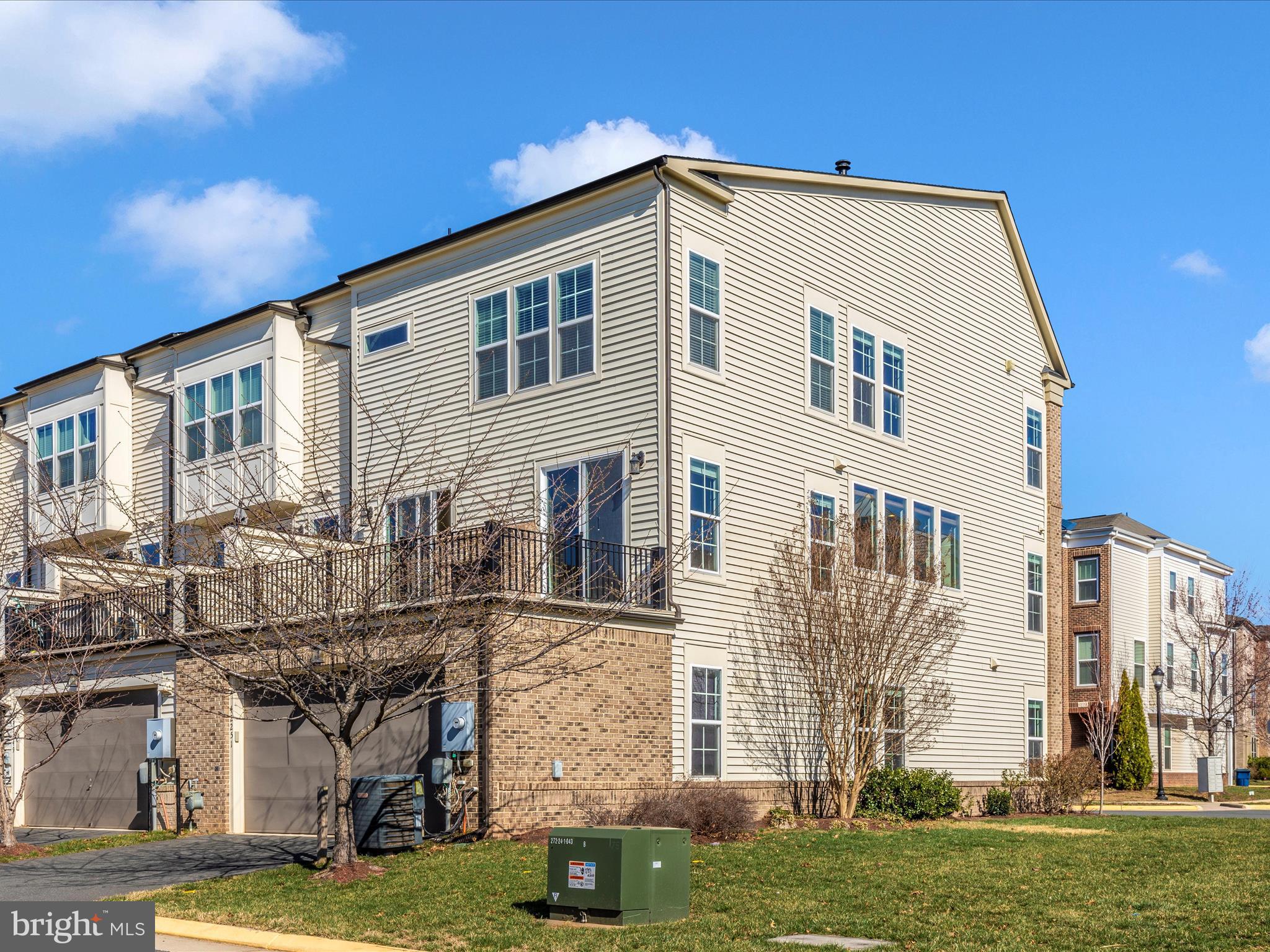42251 Riggins Ridge Terrace Brambleton, VA 20148 - Photo 53 of 62 a front view of a house with a yard