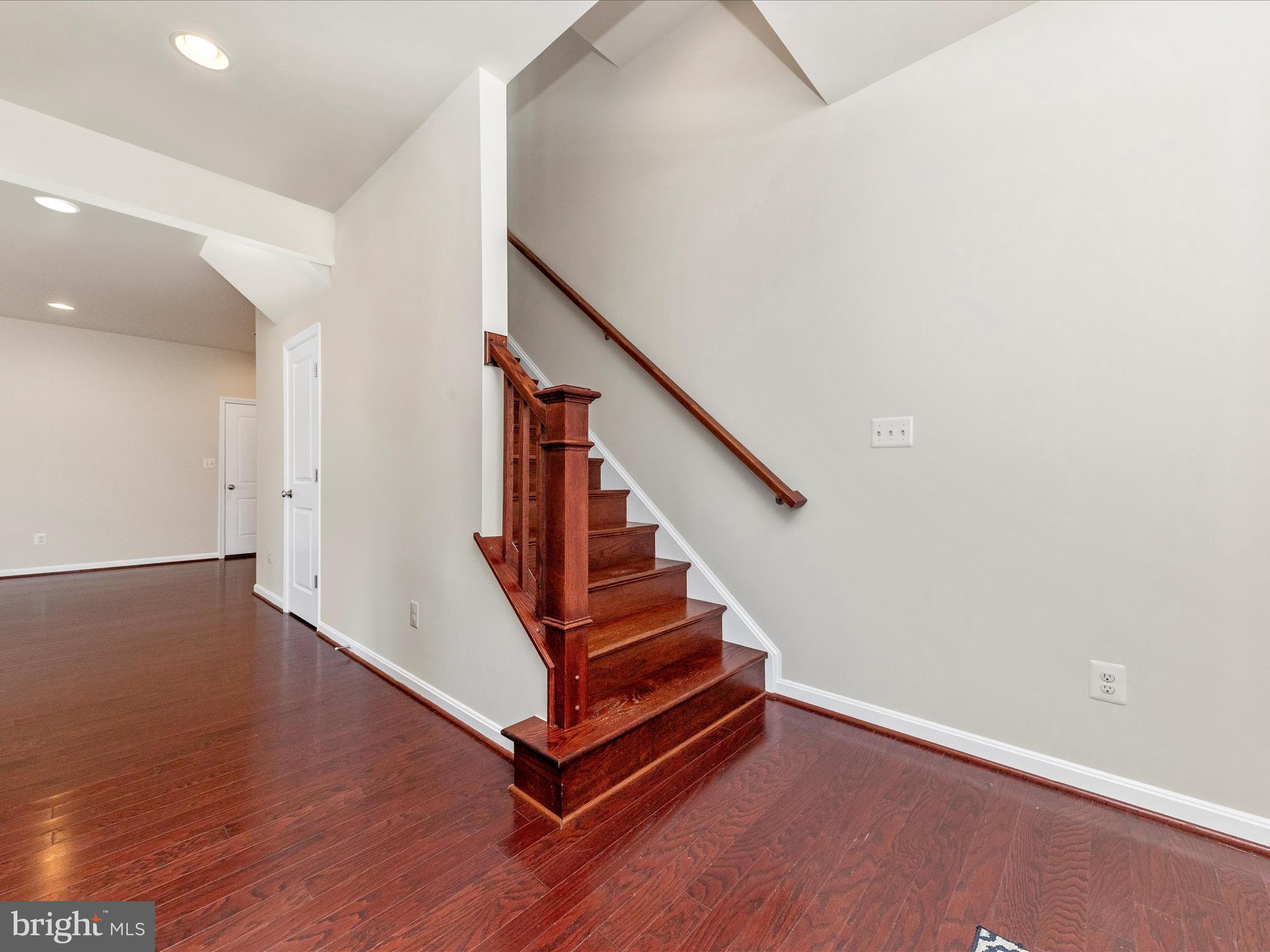 42251 Riggins Ridge Terrace Brambleton, VA 20148 - Photo 10 of 62 a view of entryway with wooden floor