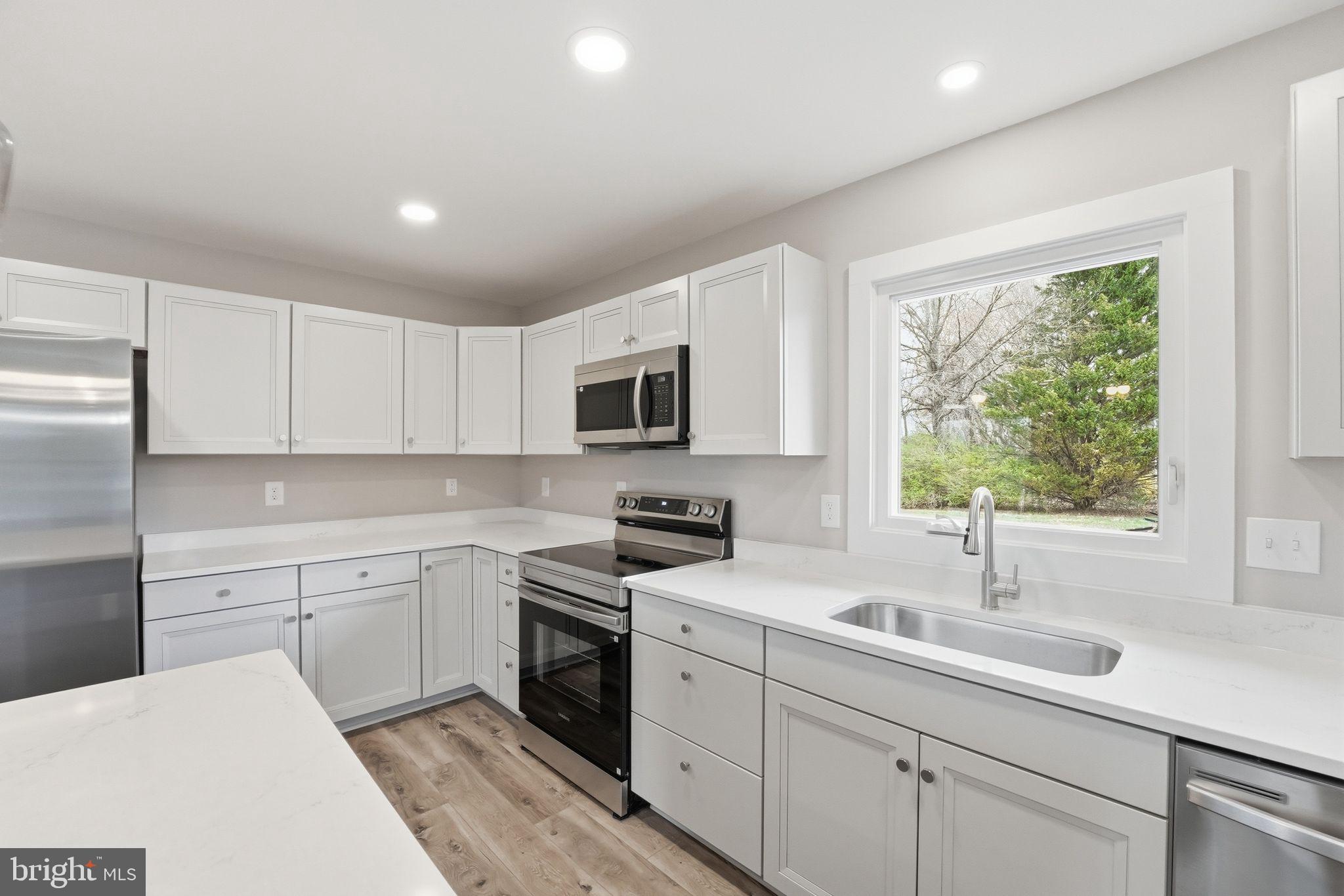 11346 Obannons Mill Road Boston, VA 22713 - Photo 17 of 101 Modern kitchen with sleek finishes.