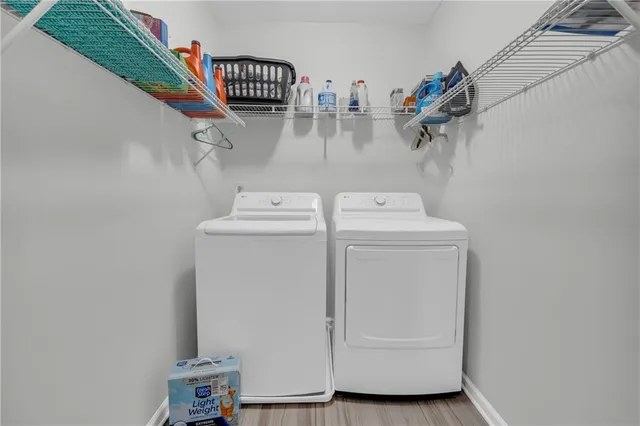 a utility room with dryer and washer