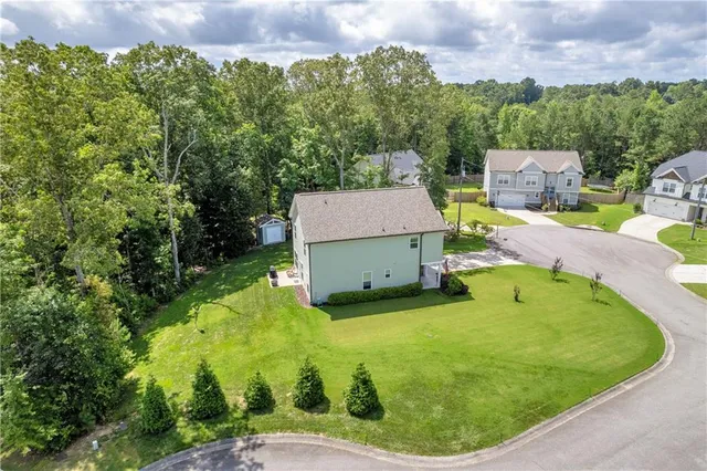 a view of a swimming pool with a garden