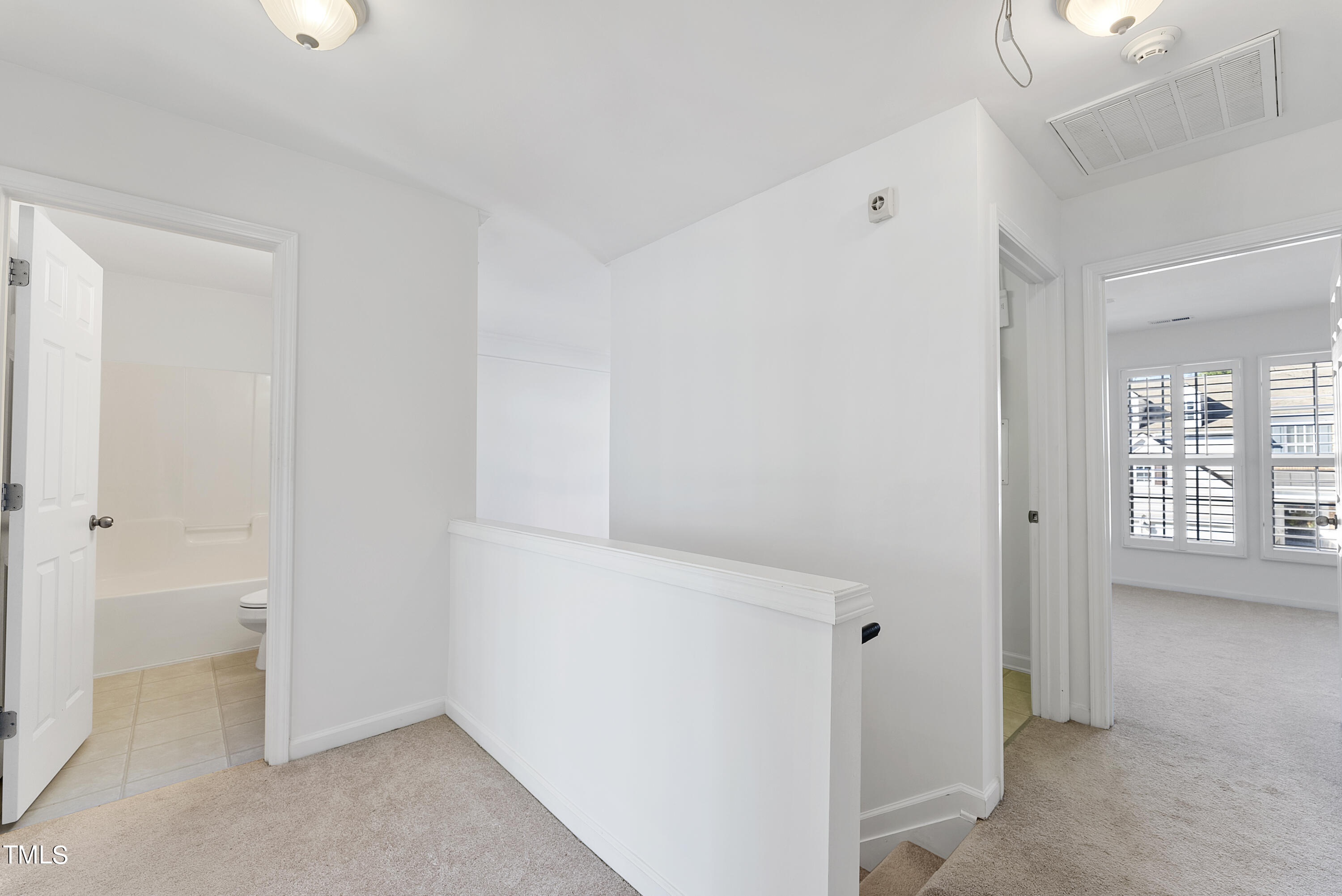 7717 Tanby Court Raleigh, NC 27613 - Photo 23 of 33 a view of an empty room