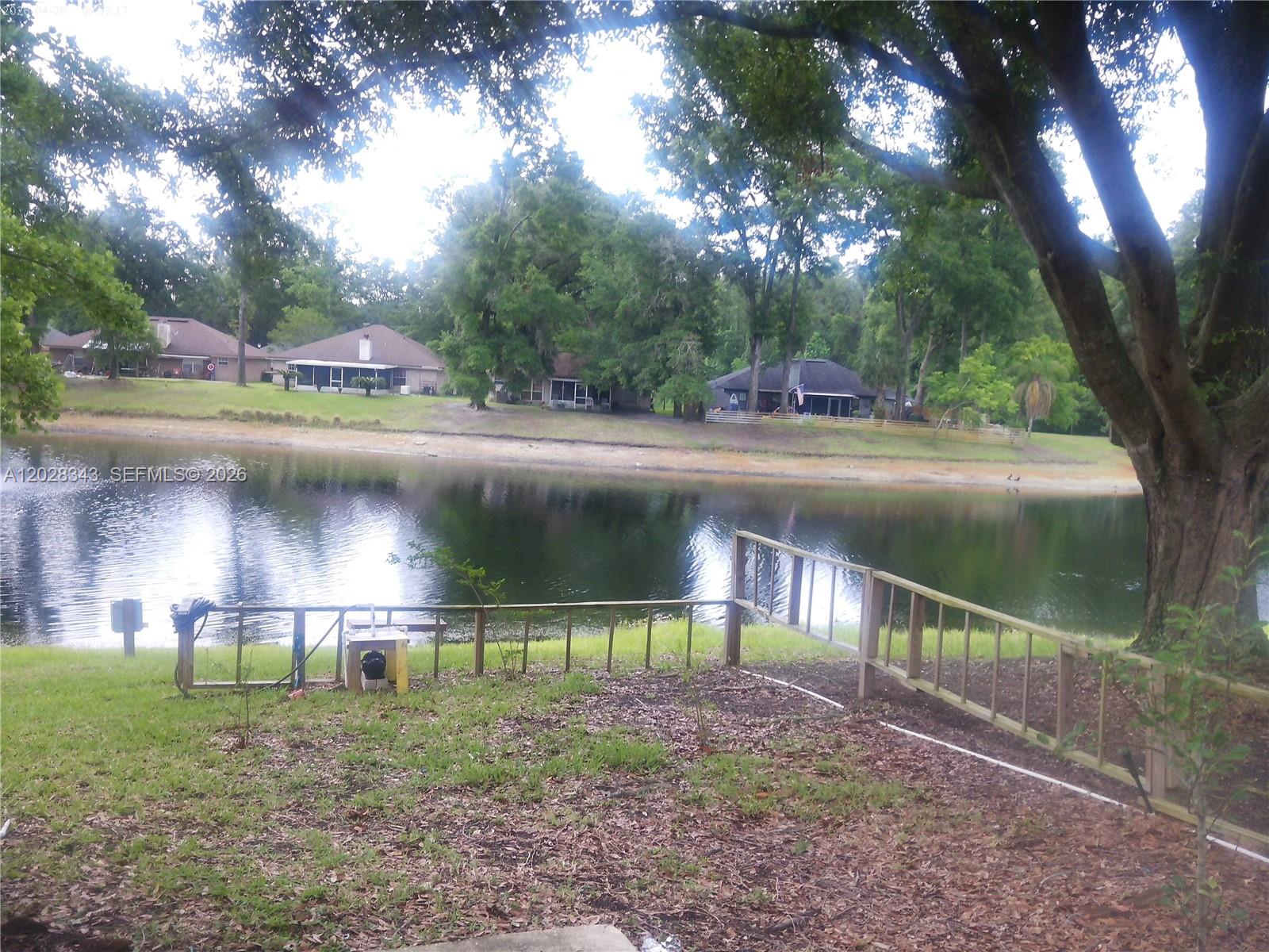 1641 Spring Oaks Lane Jacksonville, FL 32221 - Photo 41 of 44 a view of a yard with a fountain