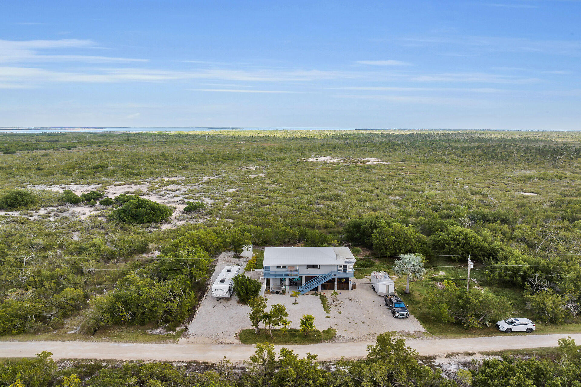 3231 Pompano Street Big Pine Key, FL 33043 - Photo 4 of 42 a view of a city with an ocean