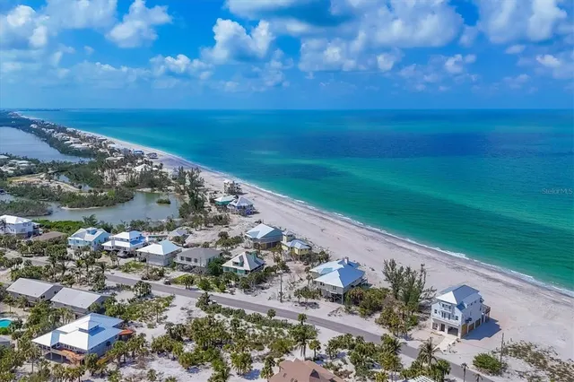 a sign board with a lake view