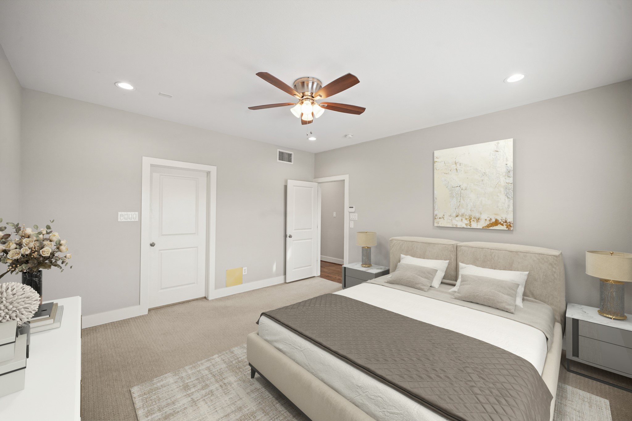 2547 Calumet Street Houston, TX 77004 - Photo 19 of 28 a bedroom with a large bed and a chandelier