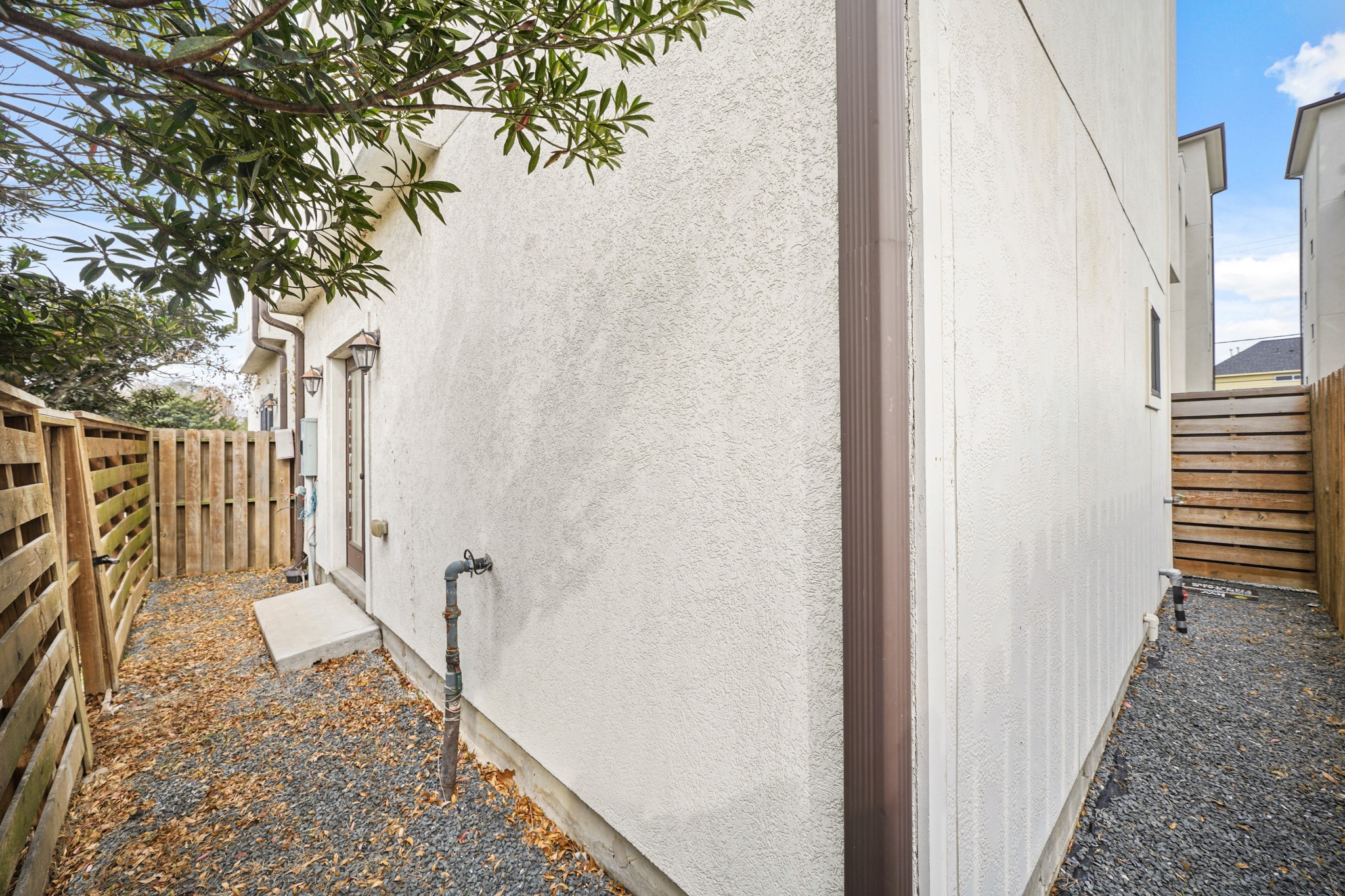 2547 Calumet Street Houston, TX 77004 - Photo 4 of 28 a view of a pathway of a house with wooden fence