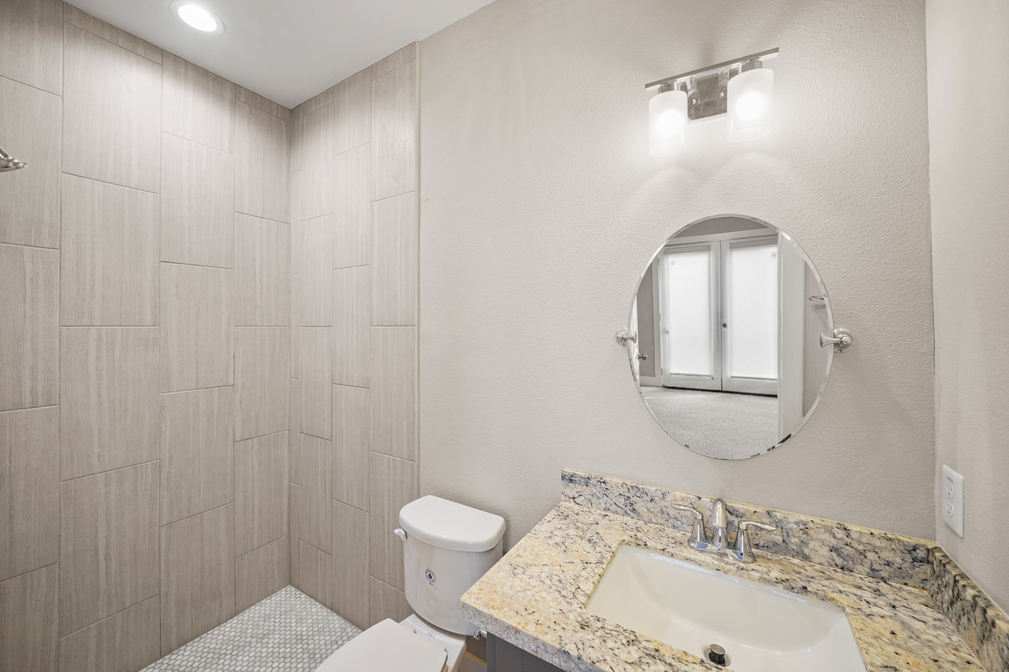 2547 Calumet Street Houston, TX 77004 - Photo 7 of 28 a bathroom with a sink and a mirror