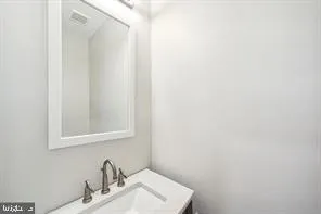 a kitchen with a refrigerator stove and sink