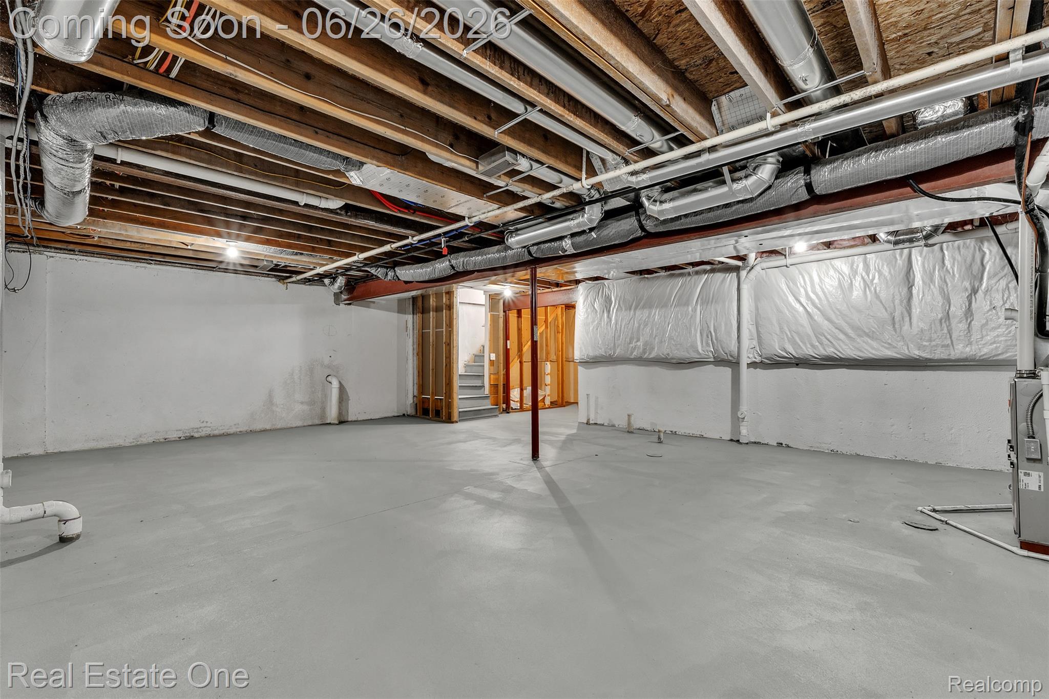 41590 Mitchell Road Novi, MI 48377 - Photo 37 of 45 Expansive unfinished basement featuring concrete flooring and exposed ceiling joists
